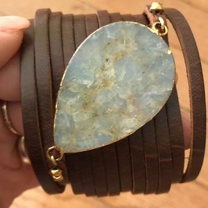 South moon under large gem and leather bracelet